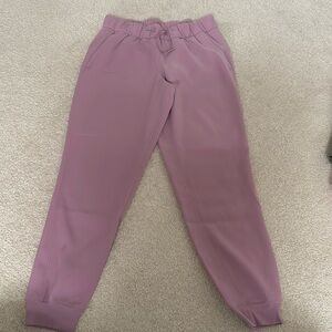 Lululemon on the fly joggers 28” dusty pink color size 6